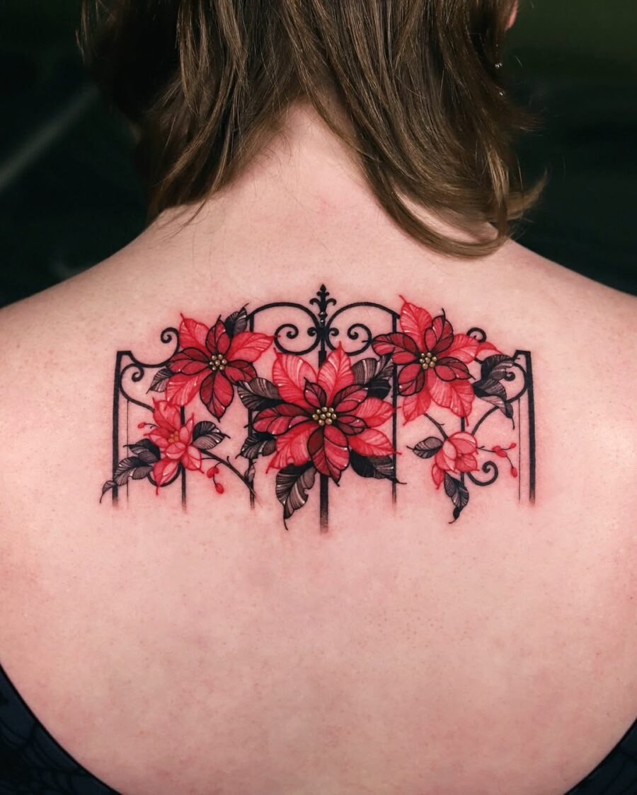Stunning Poinsettia Tattoo on Back Tattoo Design