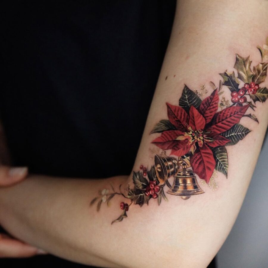 Vibrant poinsettia tattoo with bell detail Tattoo Design