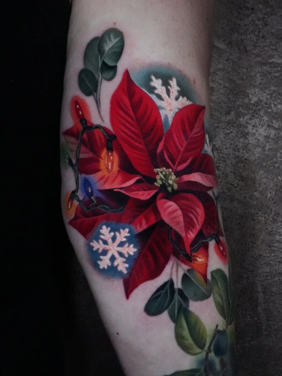 Vibrant poinsettia tattoo with festive details Tattoo Design
