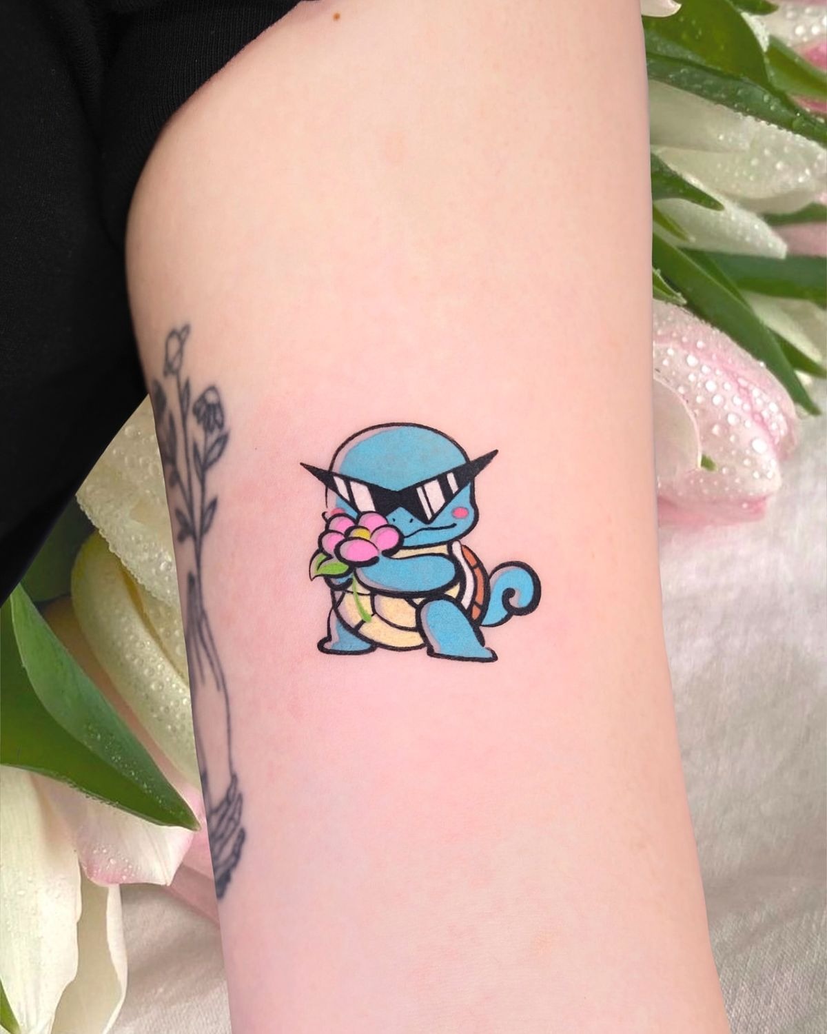 Flower-Holding Squirtle Tattoo Design