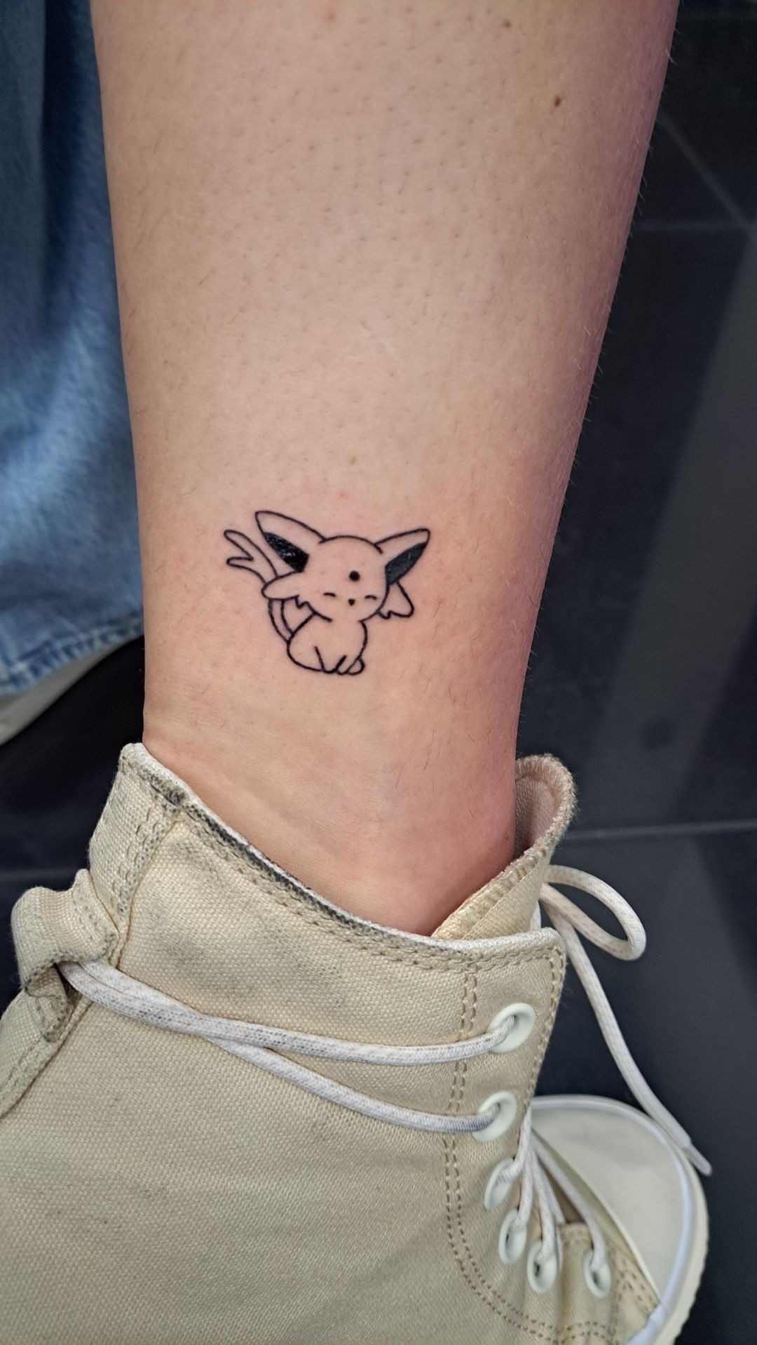 Tiny Pichu Linework Tattoo Design