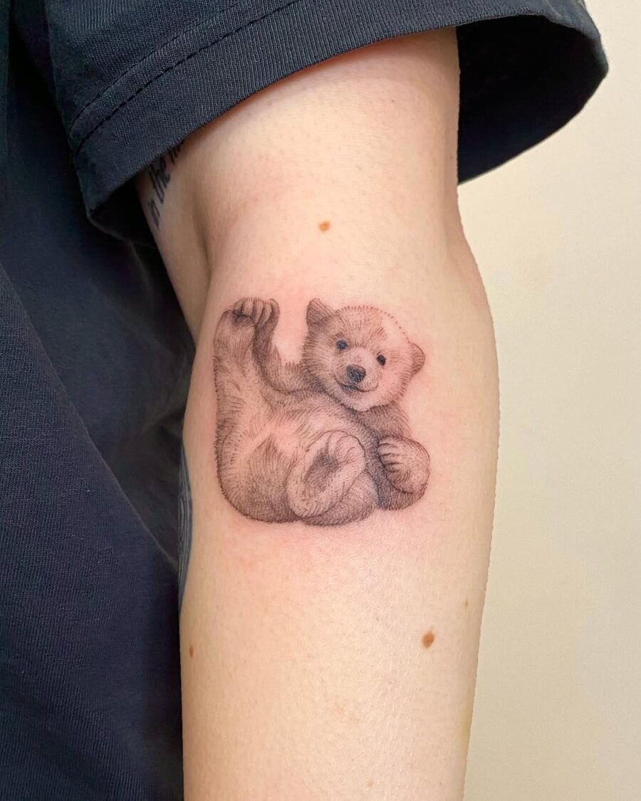 Adorable polar bear tattoo showcasing playful spirit Tattoo Design