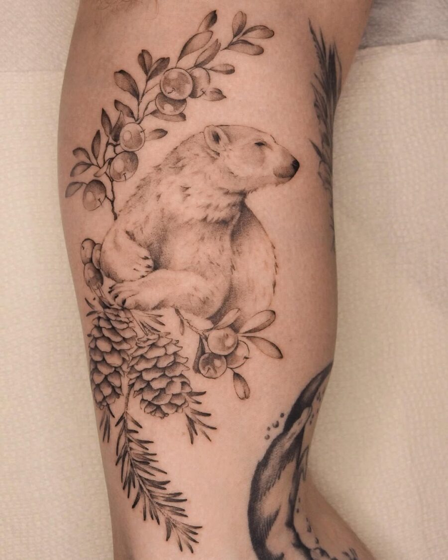 Elegant polar bear tattoo blending with nature Tattoo Design