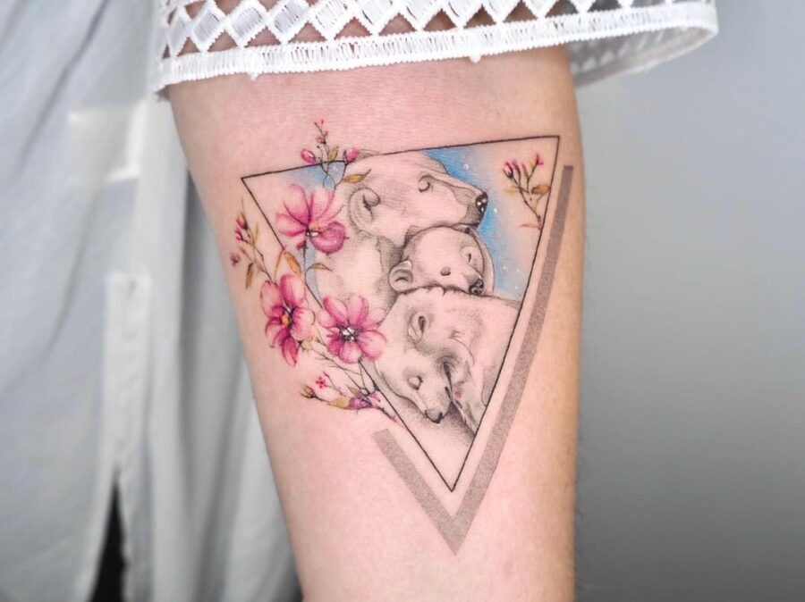Whimsical Polar Bear Tattoo with Floral Elements Tattoo Design