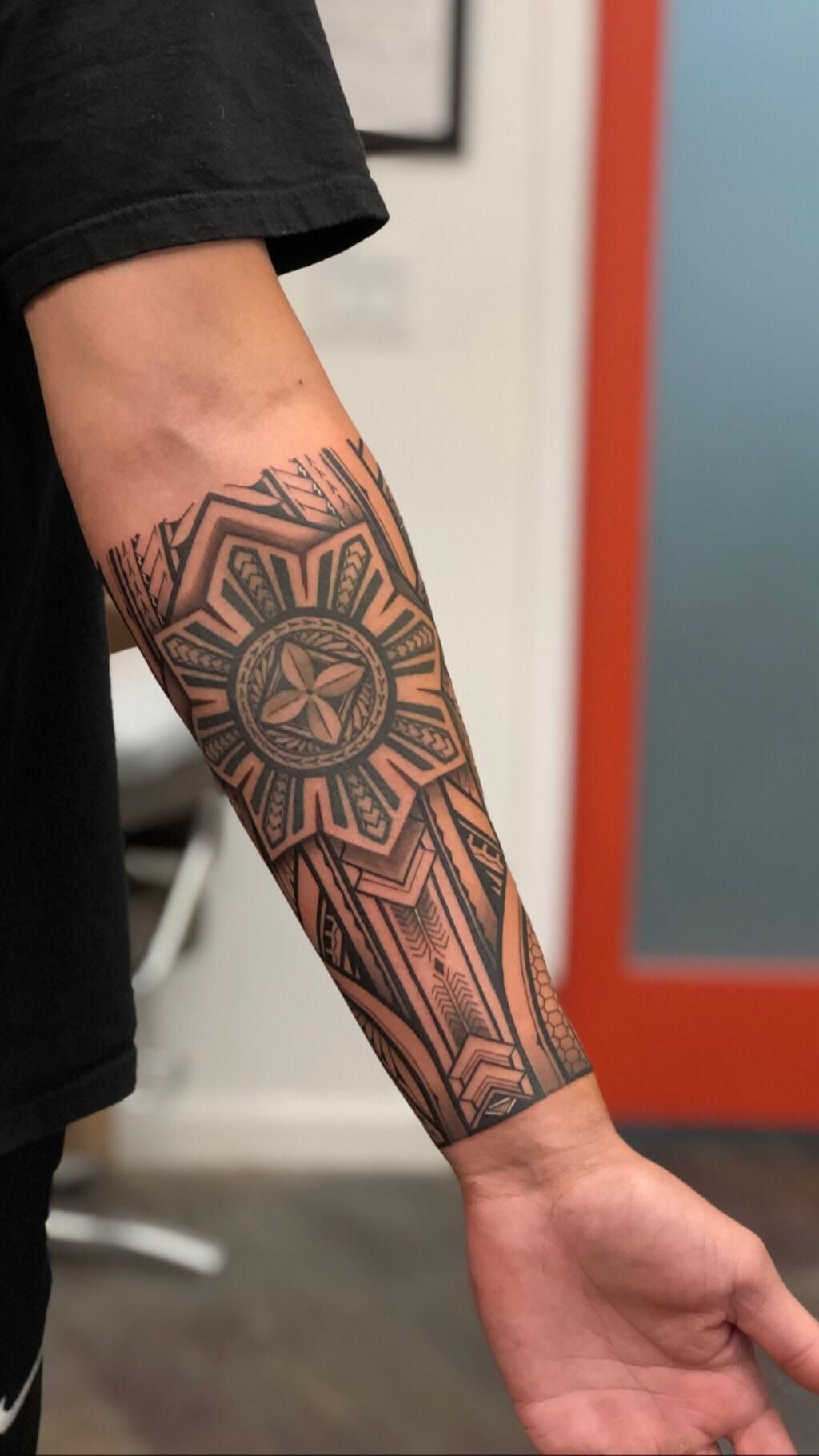 Chevron and Geometric Polynesian Forearm Tattoo Design