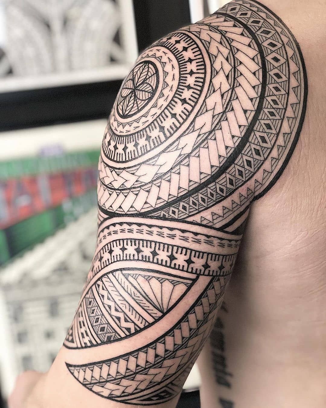 Sunburst Polynesian Forearm Tattoo Design
