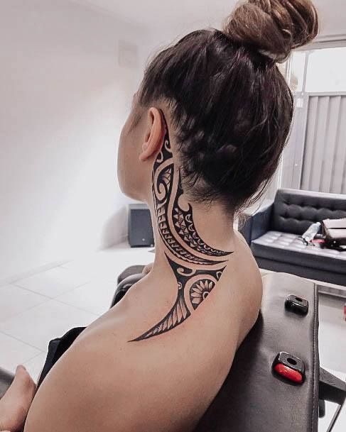 Wave-Inspired Polynesian Forearm Tattoo Design