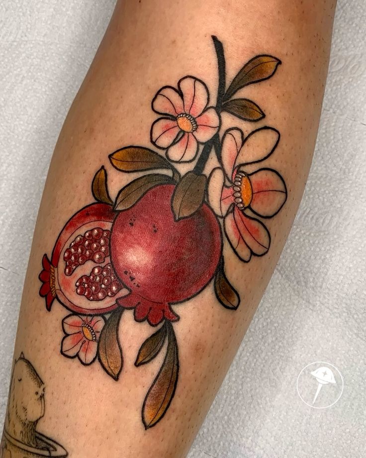 American Traditional-Inspired Pomegranate With Bright Floral s Tattoo Design