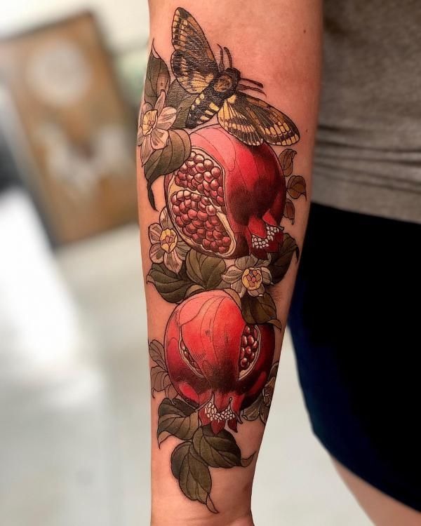 Anatomical Heart Pomegranate in Vivid Red Tattoo Design