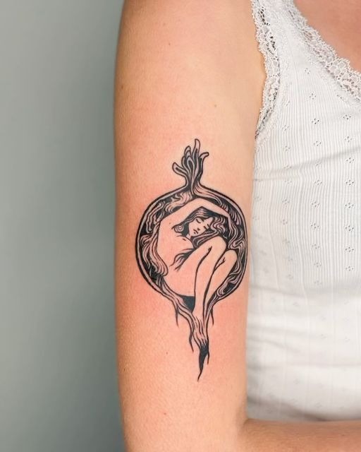 Bold Hand Pomegranate in American Traditional Style Tattoo Design