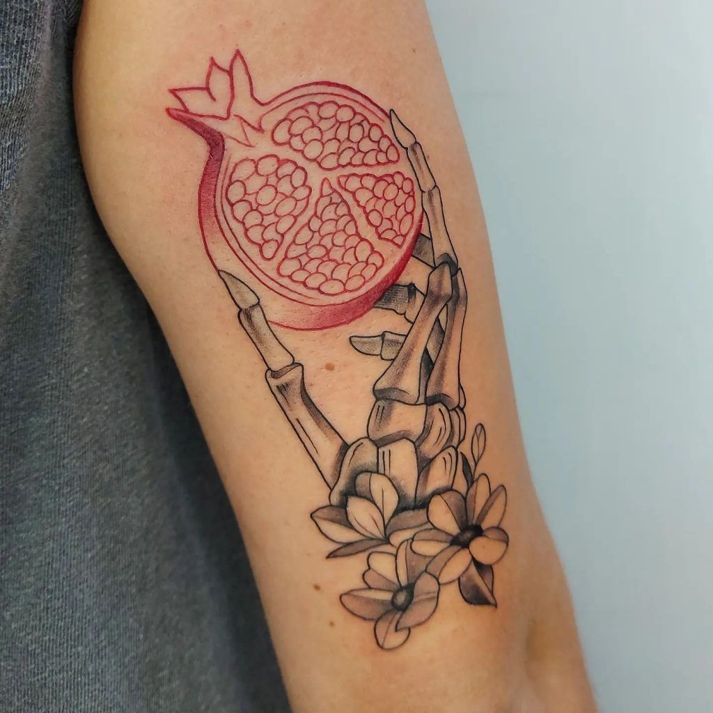Flowing Neo-Traditional Pomegranate with Wild Florals Tattoo Design