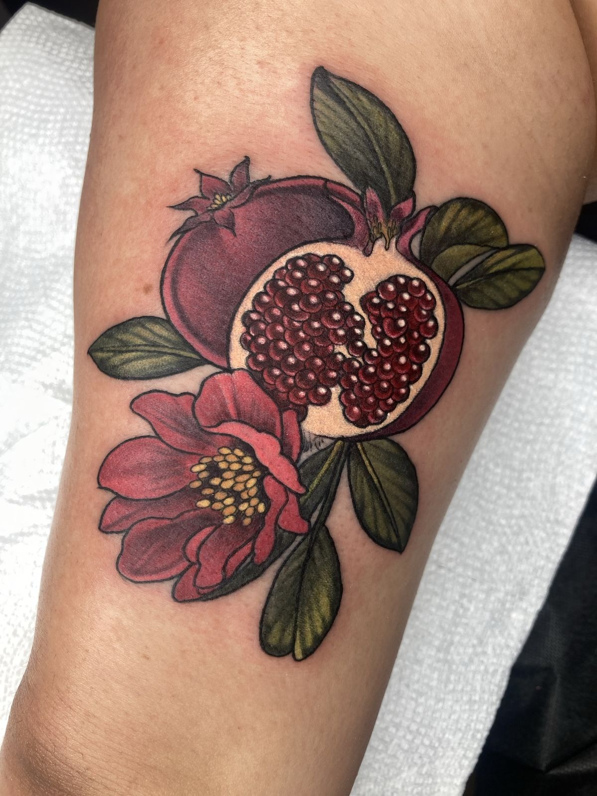 Graphic Red Pomegranate with Fine Line Details Tattoo Design