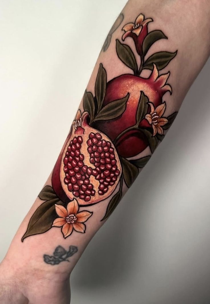 Simple Black Pomegranate Tattoo with Bold Outline Tattoo Design