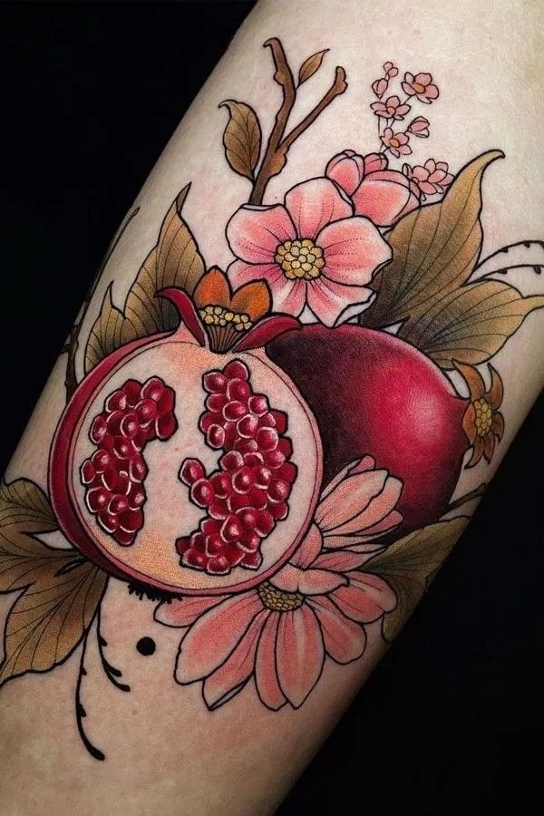 Skeleton Hand Holding Pomegranate Tattoo Tattoo Design