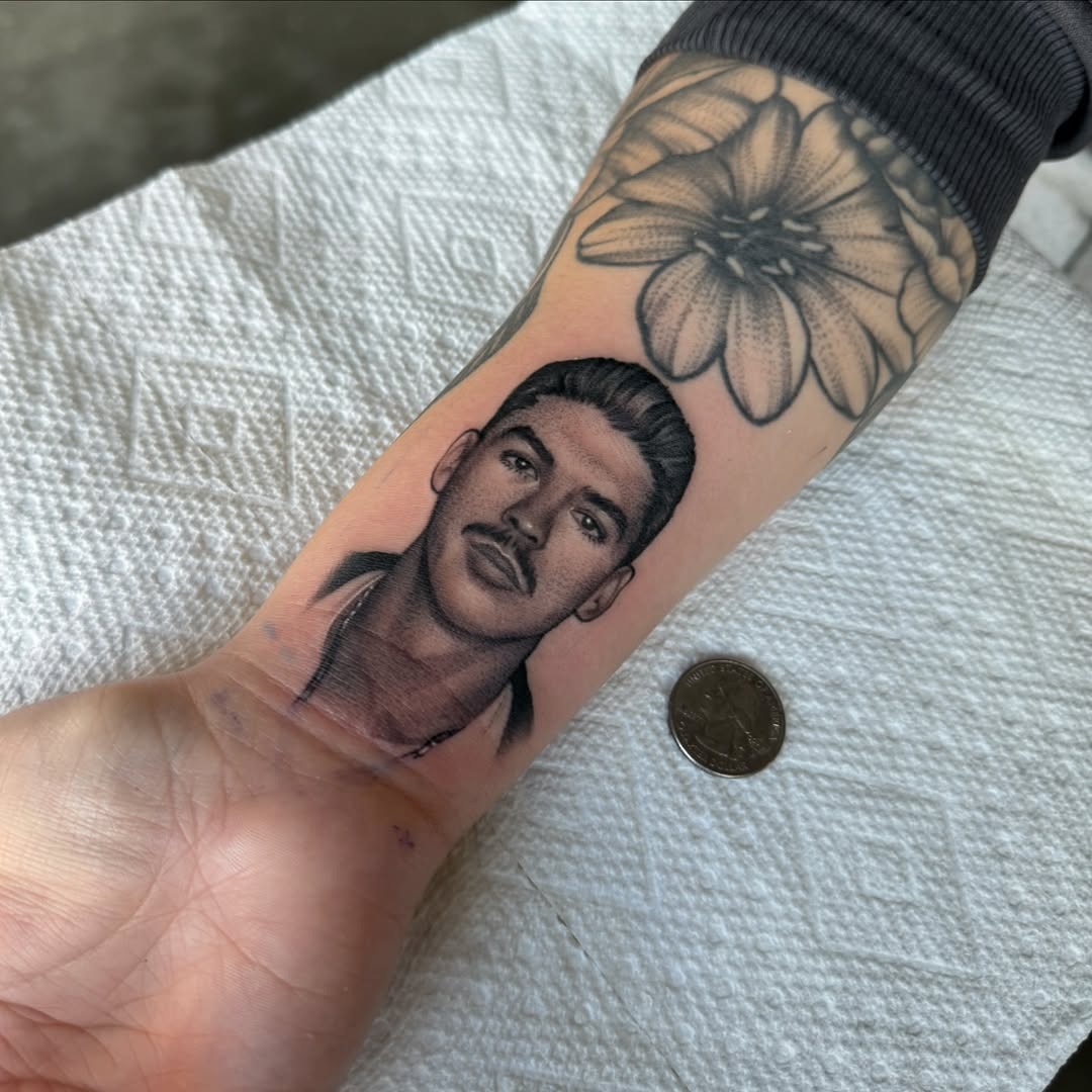 Intricate male portrait tattoo on forearm Tattoo Design