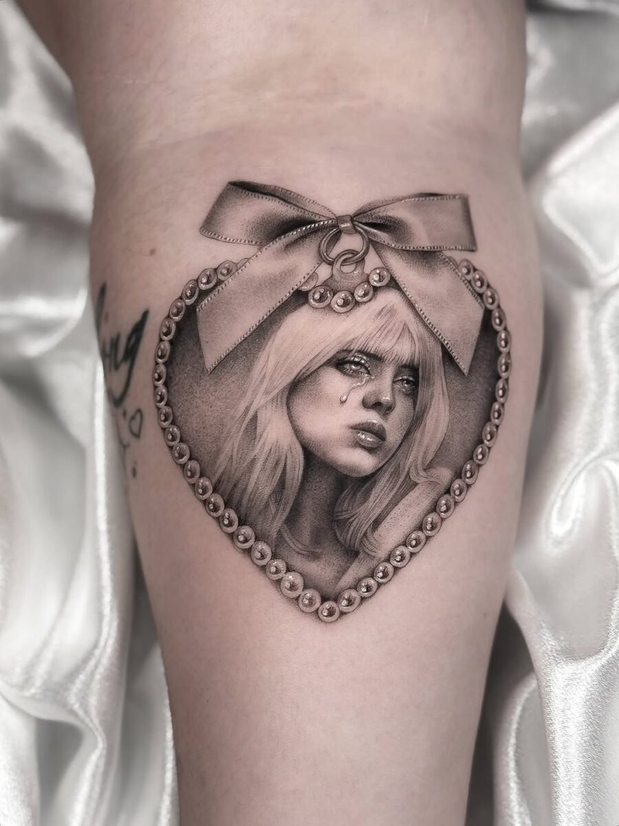 Intricate portrait tattoo with ribbon and pearls Tattoo Design