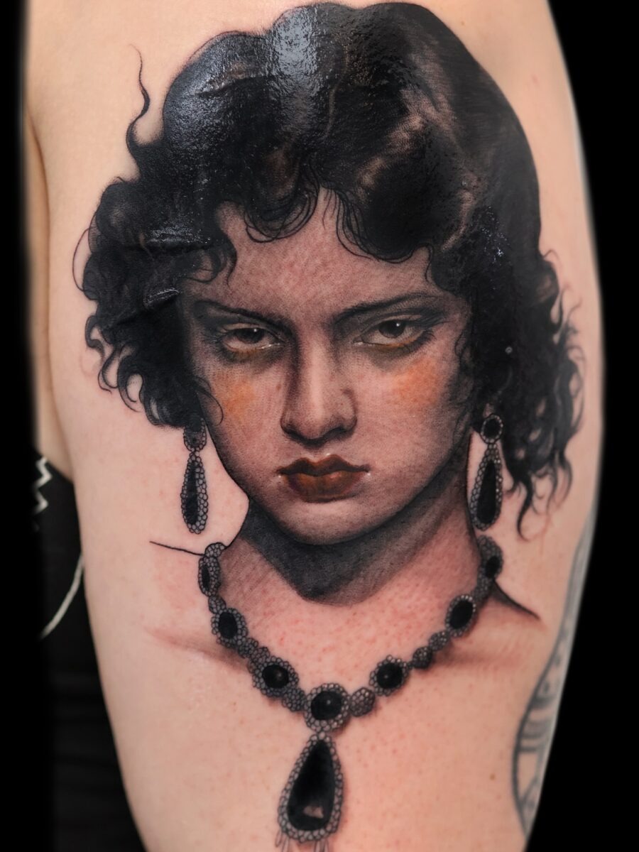 Intricate vintage woman portrait tattoo on skin Tattoo Design