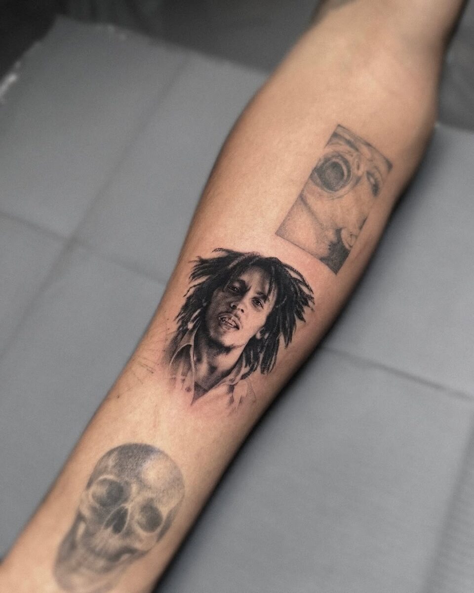 Striking portrait tattoos on forearm showcase artistry Tattoo Design