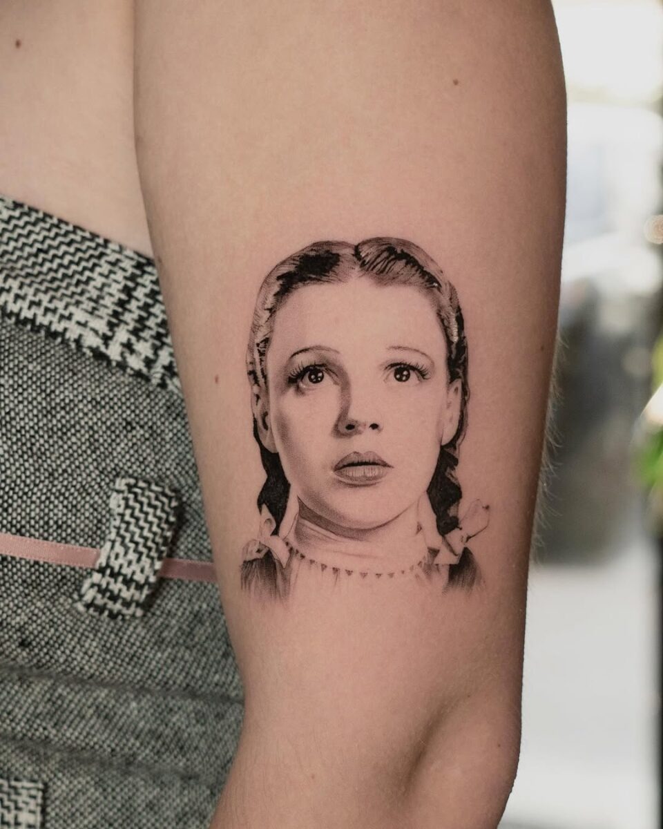 Stunning depiction of Dorothy from The Wizard of Oz Tattoo Design