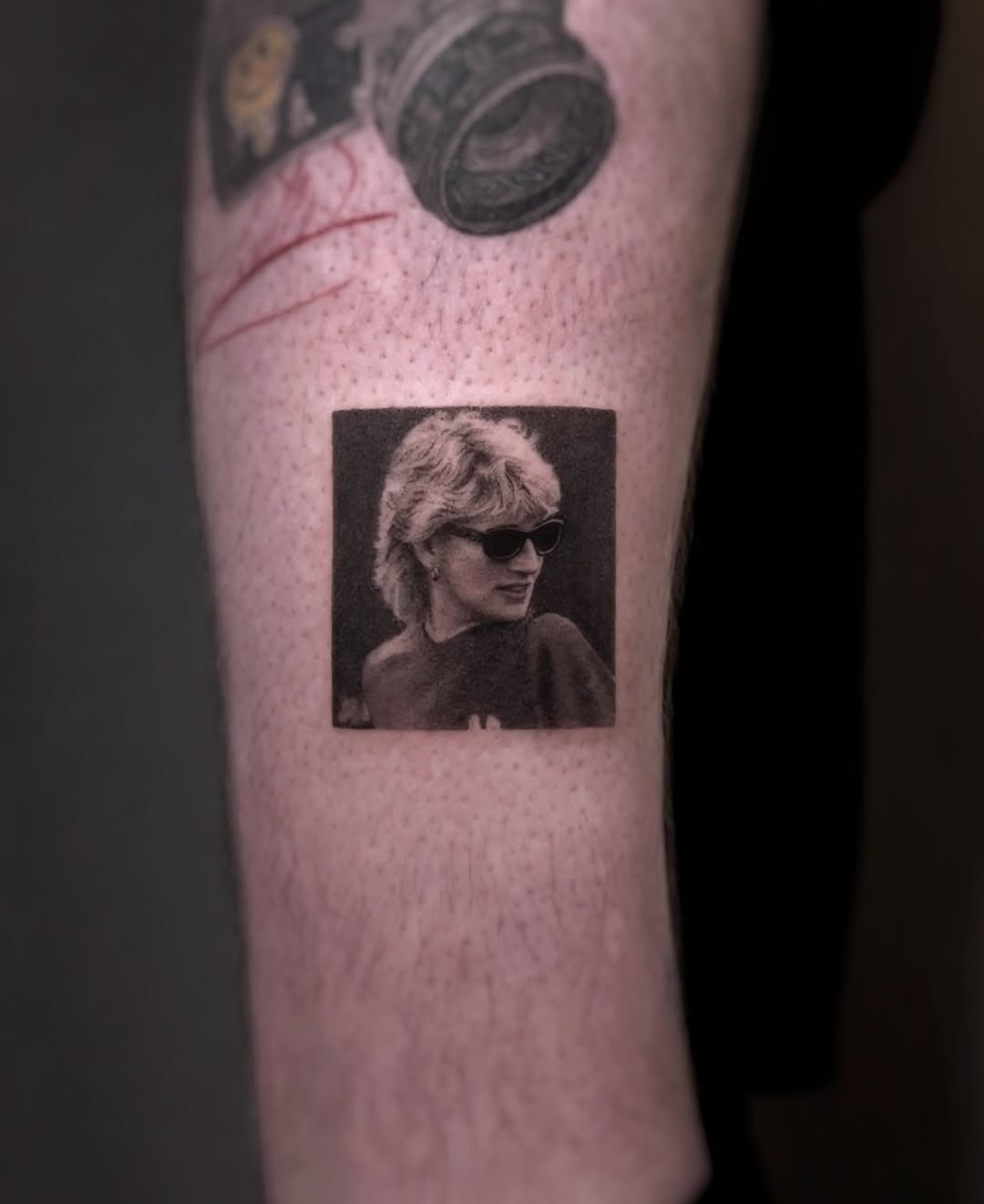 Timeless Portrait in Ink: Iconic Style Captured Tattoo Design