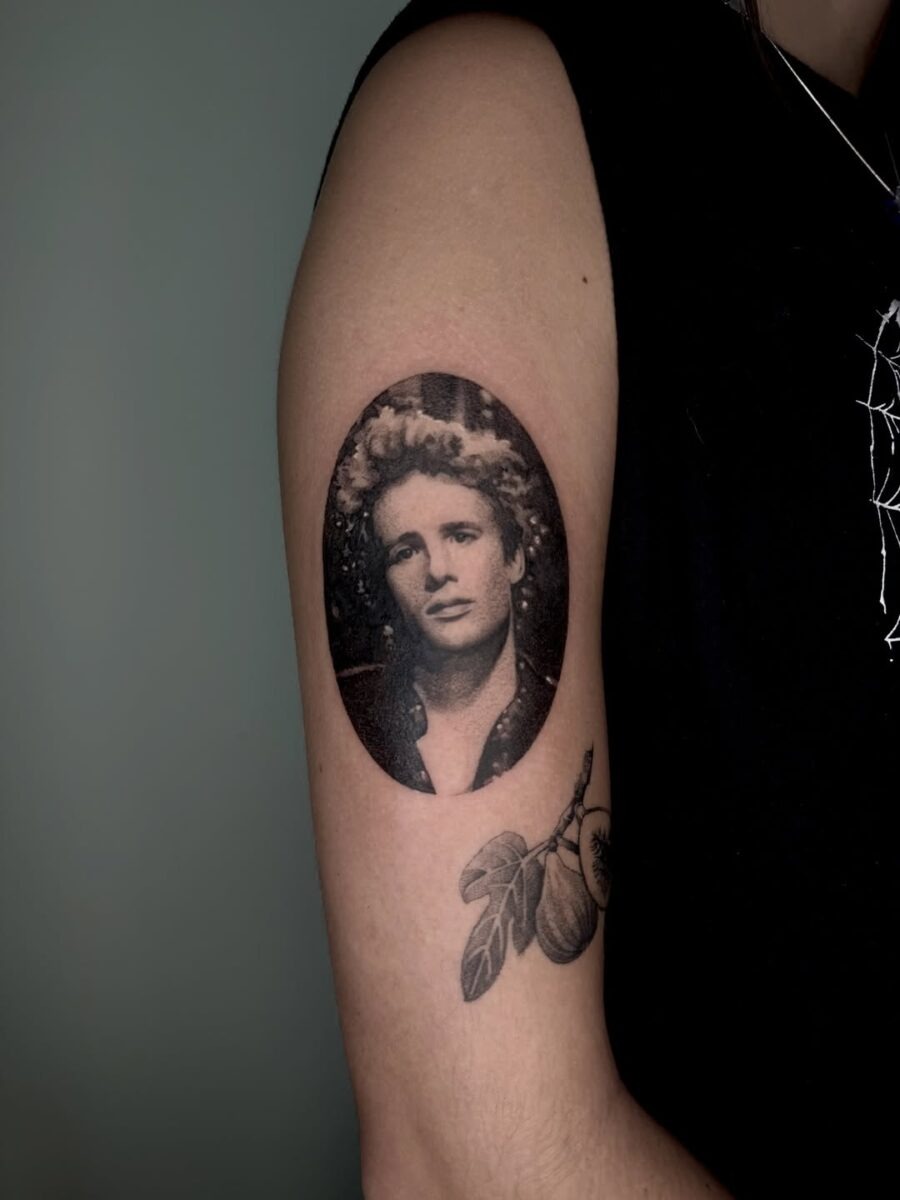 Timeless portrait tattoo with a nostalgic vibe Tattoo Design