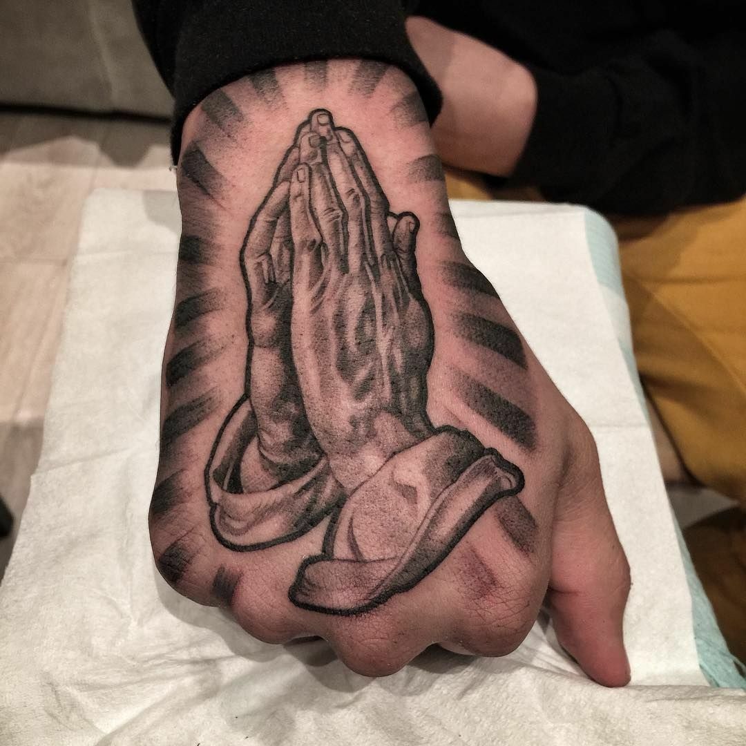 Deeply Shaded Hand Tattoo with Radiating Power Tattoo Design