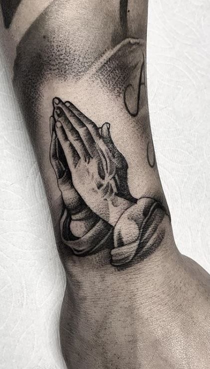 Rose and Prayer by the Ear Tattoo Design