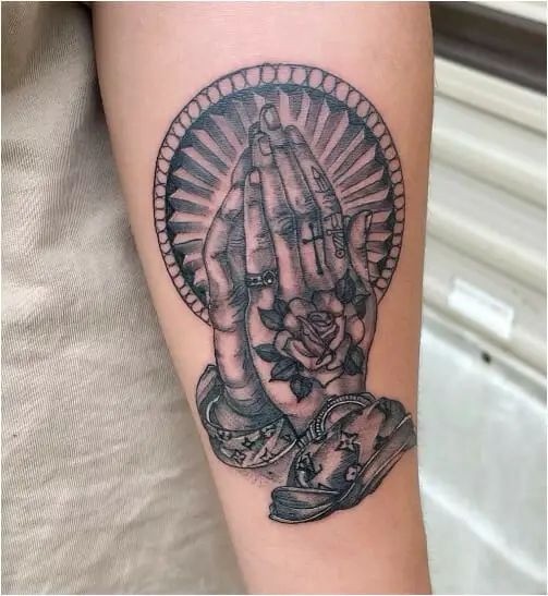 Sacred Heart-Inspired Praying Hands Tattoo Design