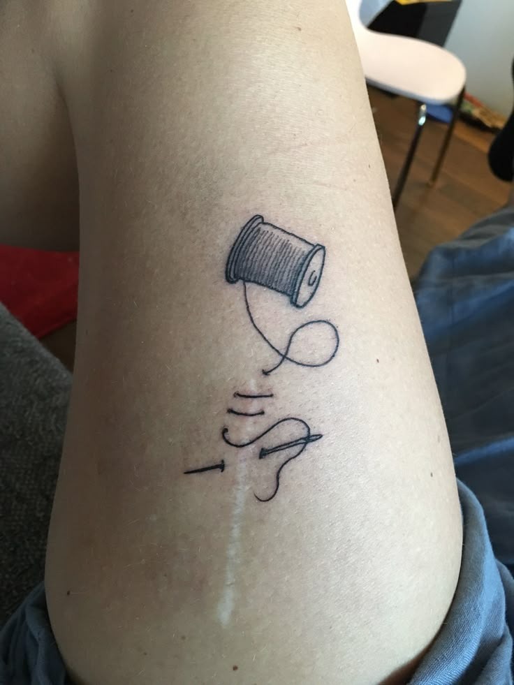 Thread and Needle Repair Tattoo Tattoo Design