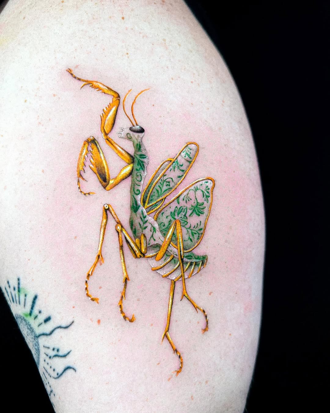 Colorful Praying Mantis Tattoo with Floral Elements Tattoo Design