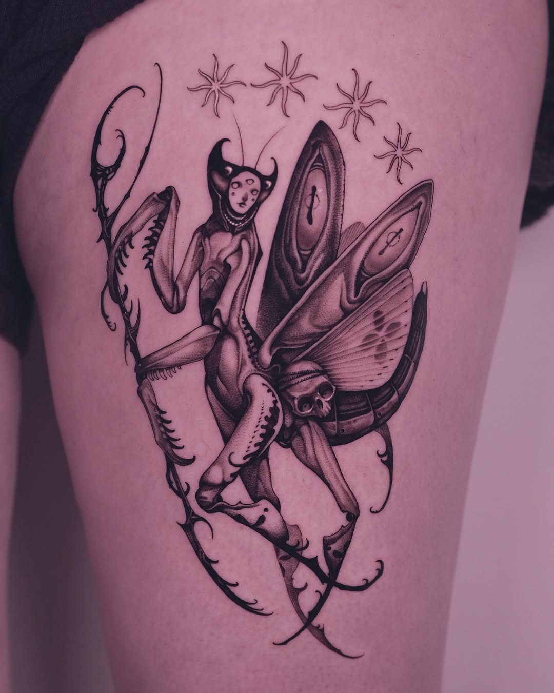 Intricate praying mantis tattoo with celestial touch Tattoo Design