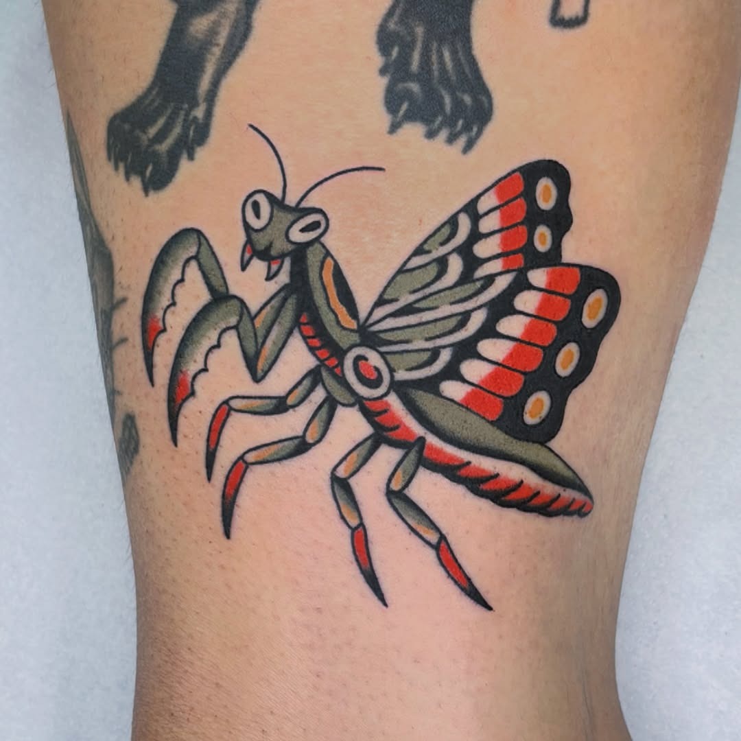 Vibrant praying mantis tattoo with striking details Tattoo Design