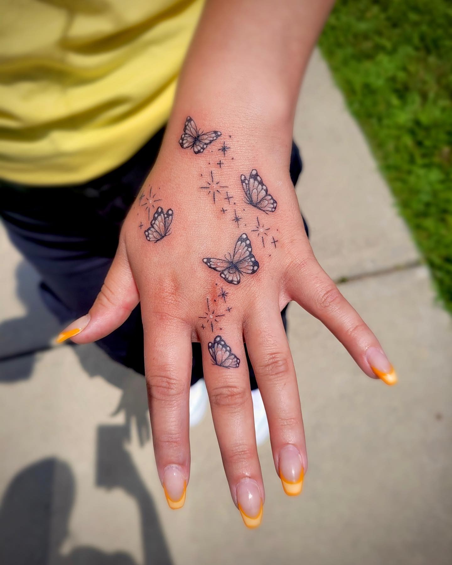 Butterflies and Sparkles Hand Tattoo Tattoo Design