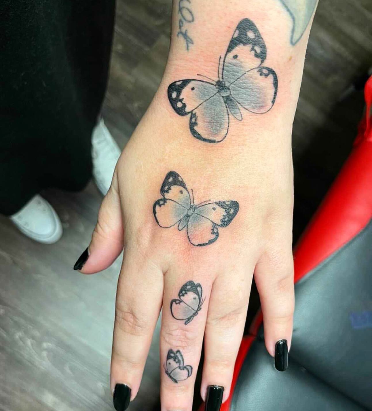 Butterflies Hand Tattoo Tattoo Design