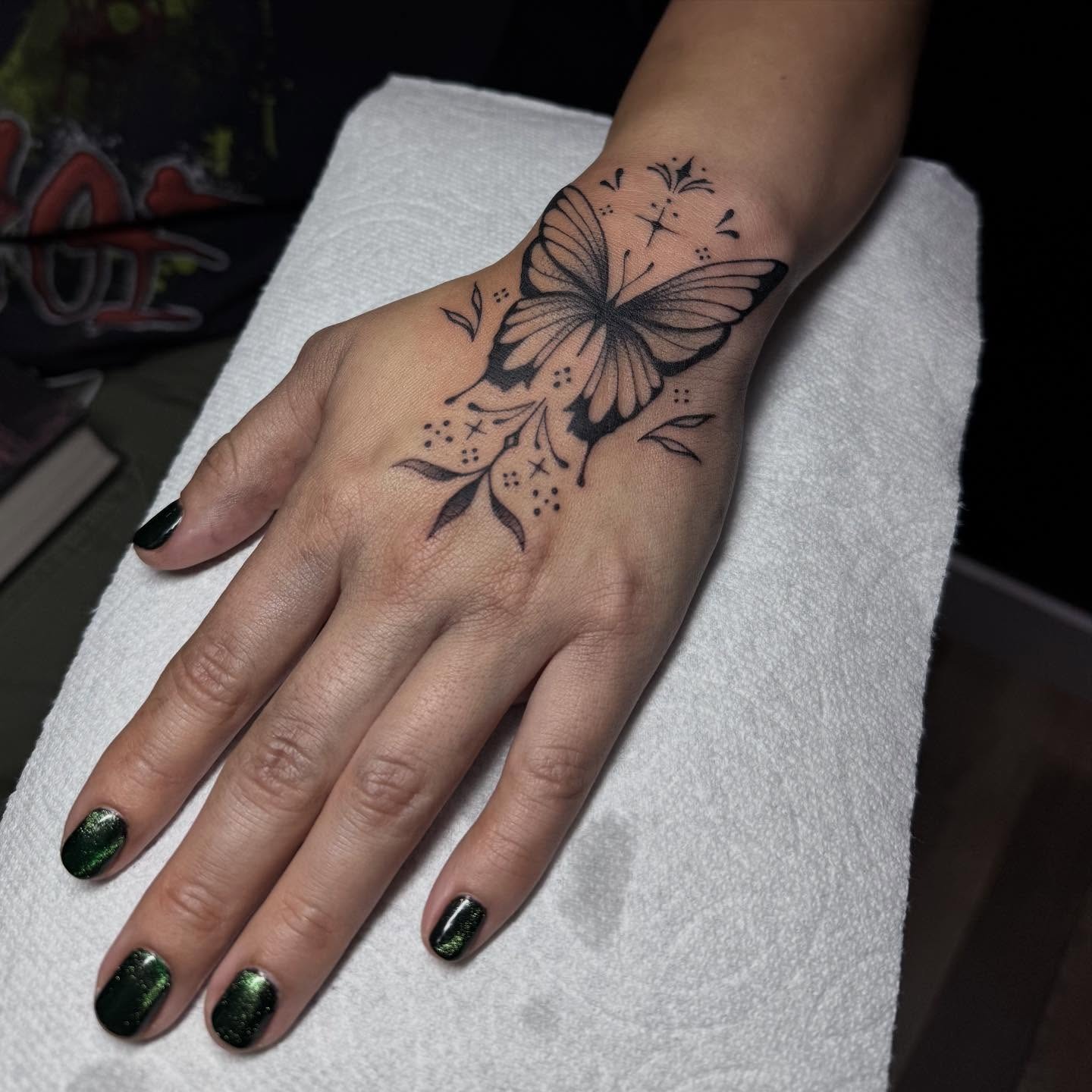 Butterfly and Leaves Hand Tattoo Tattoo Design