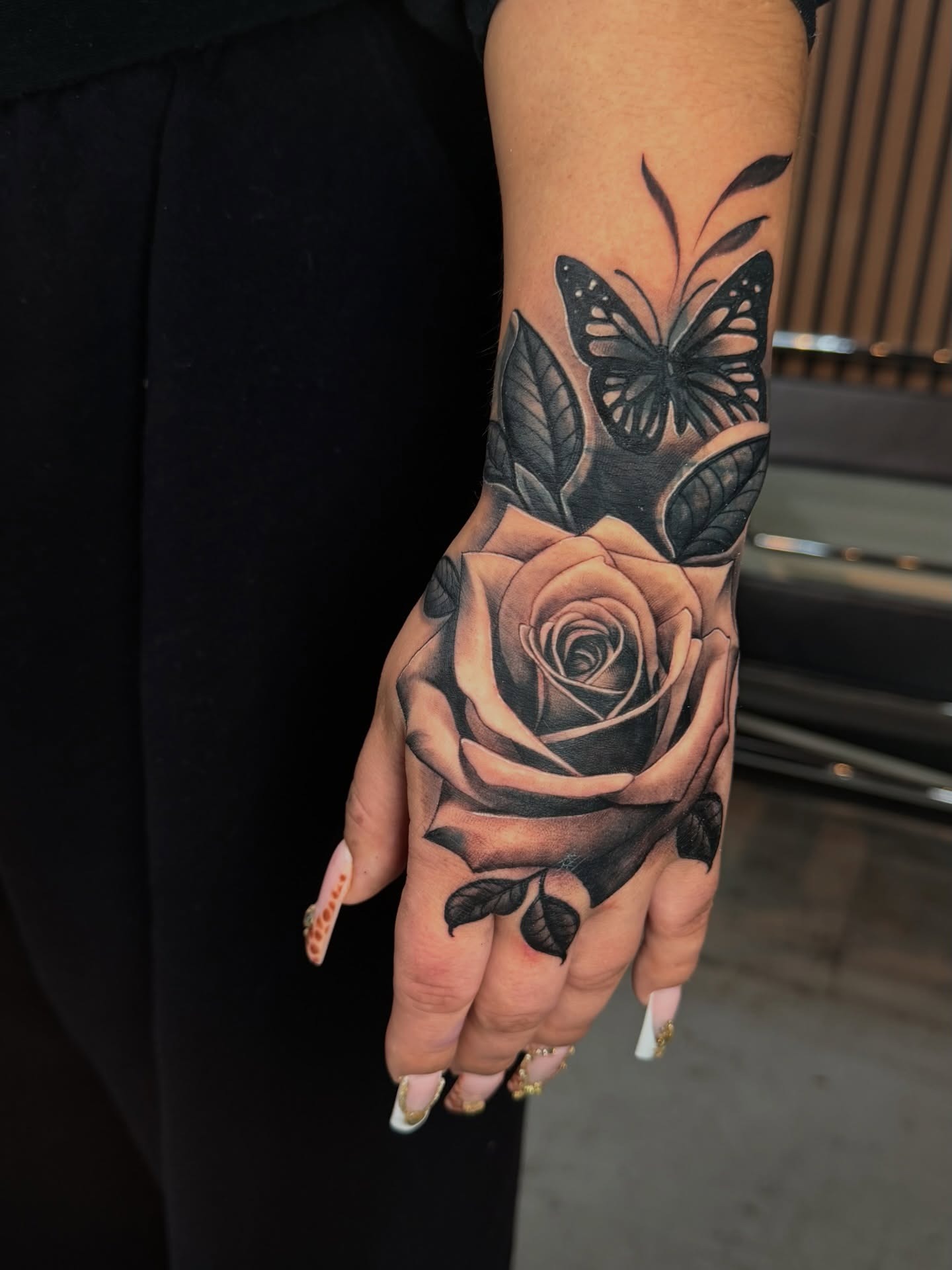 Rose and Butterfly Hand Tattoo Tattoo Design