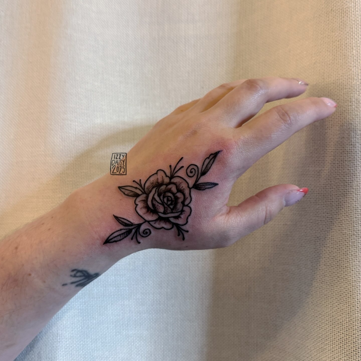 Rose and Leaves Hand Tattoo Tattoo Design