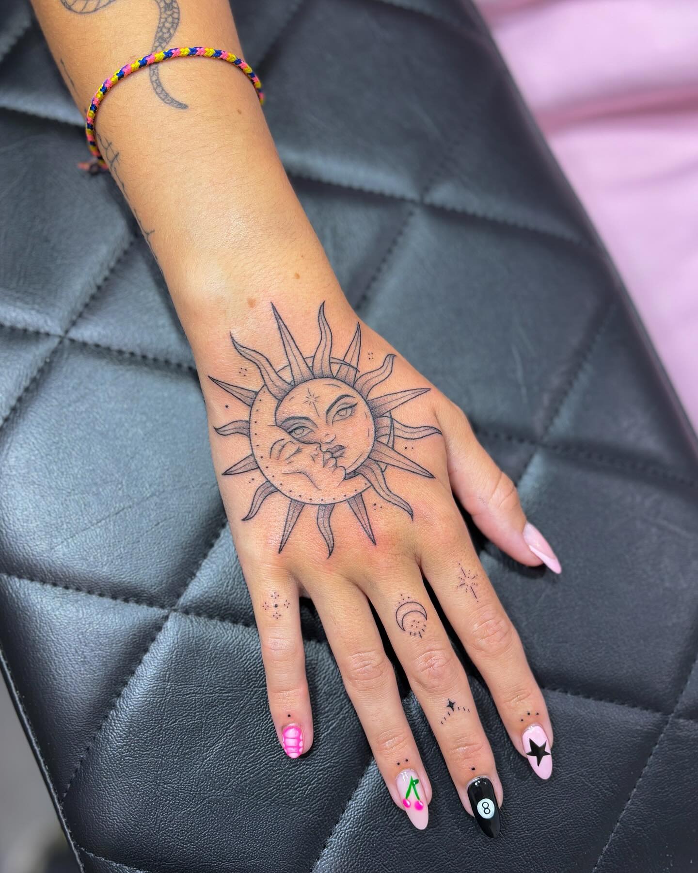 Sun and Moon Face Hand Tattoo Tattoo Design