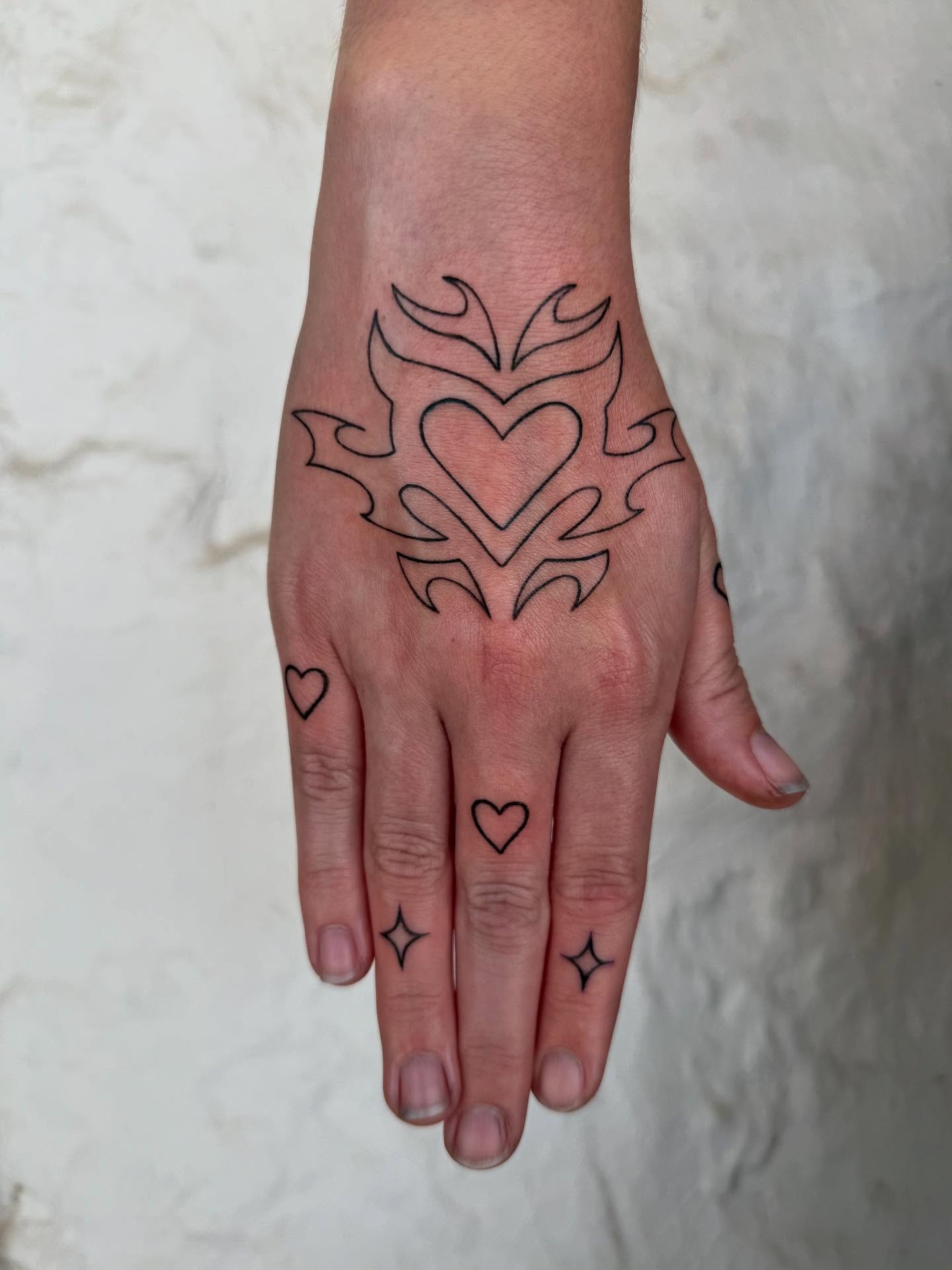 Tribal Heart Hand Tattoo Tattoo Design