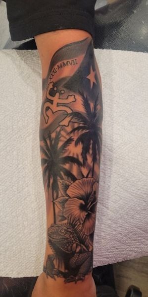 Sunset Sleeve with Island Symbols Tattoo Design