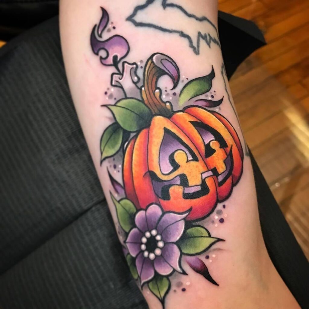 Colorful Jack-O’-Lantern and Flower Tattoo Tattoo Design