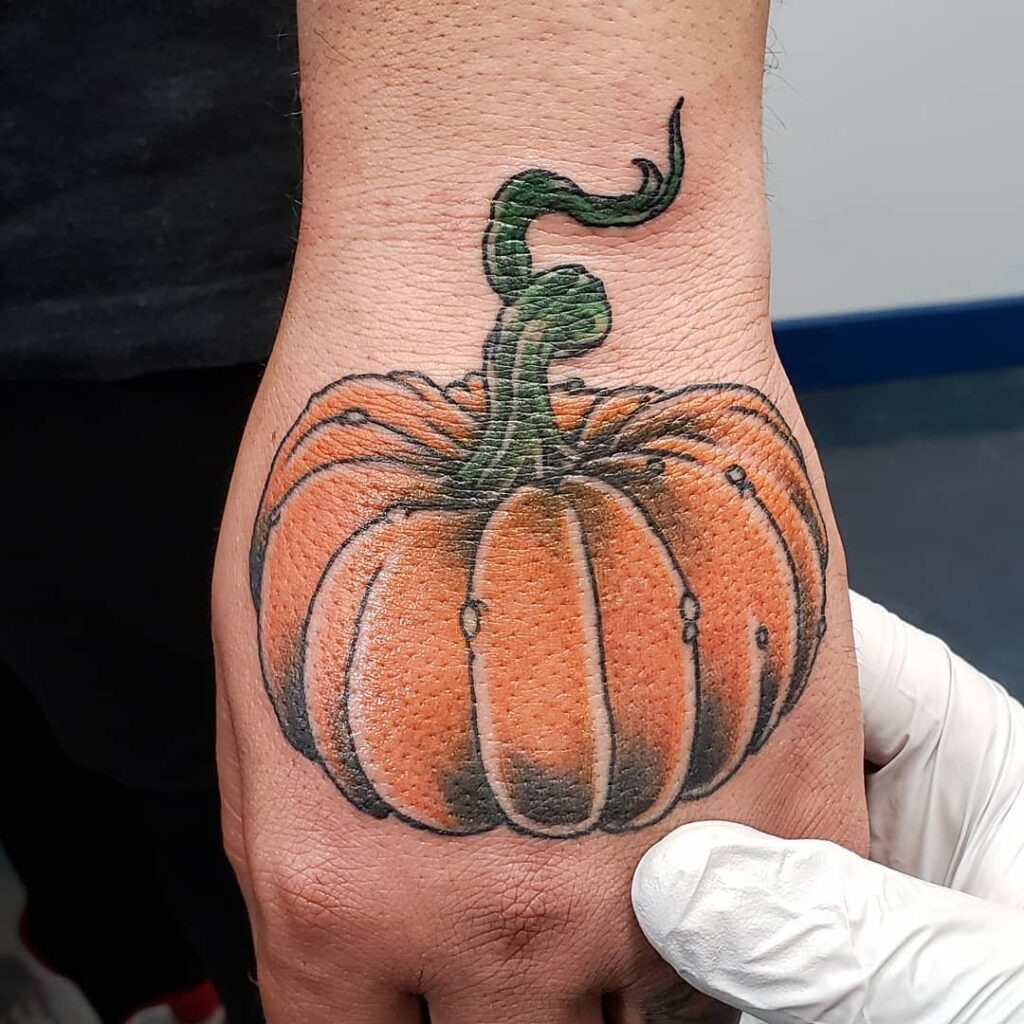 Vibrant Hand Pumpkin Tattoo Tattoo Design