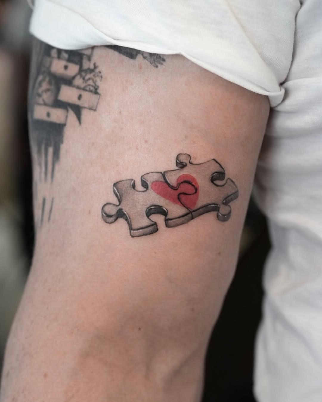 Heartfelt jigsaw tattoo with vibrant detail Tattoo Design