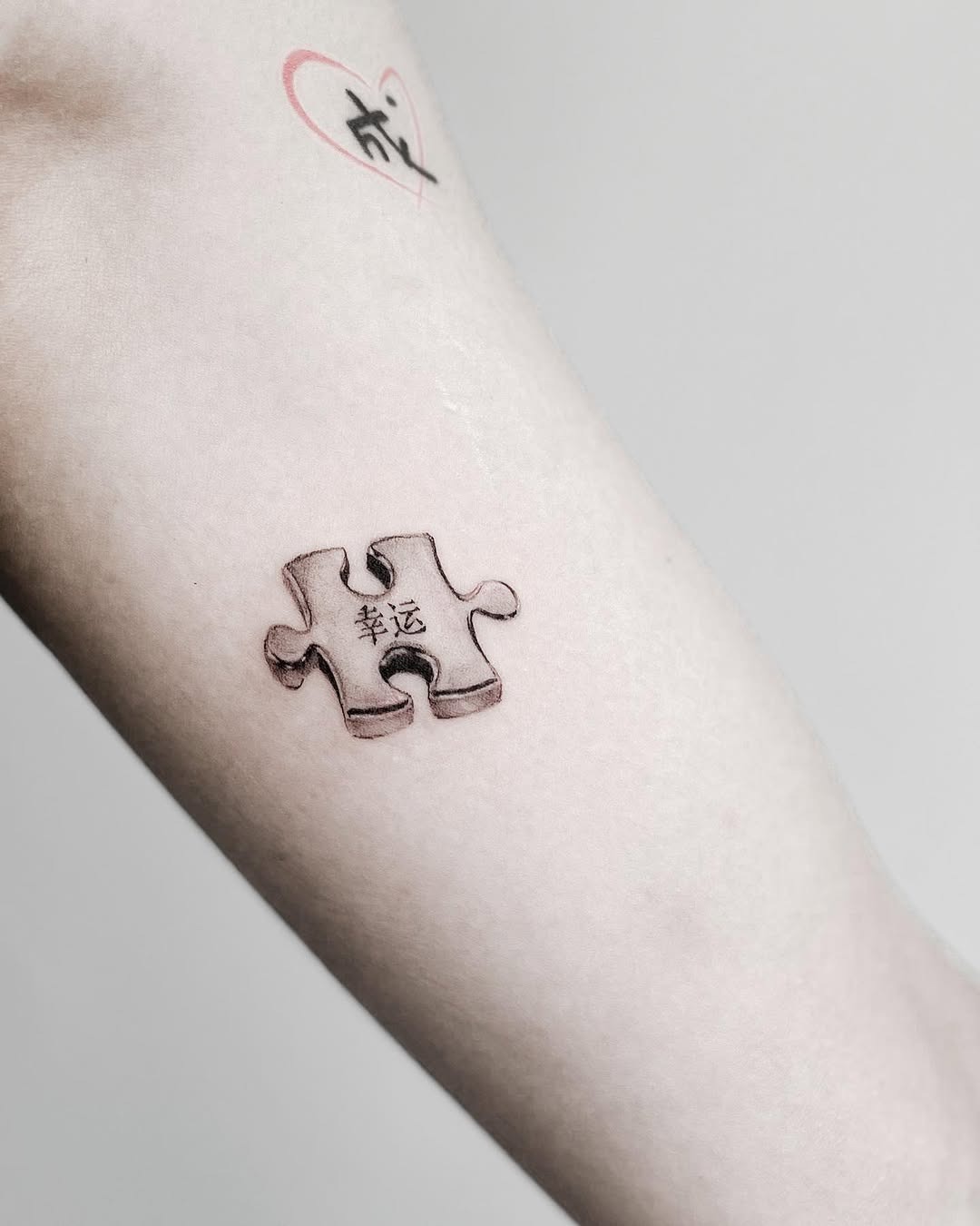 Intricate puzzle piece tattoo with symbolism Tattoo Design