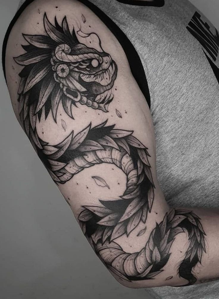 Blue and Green Feathered Serpent Head Tattoo Design