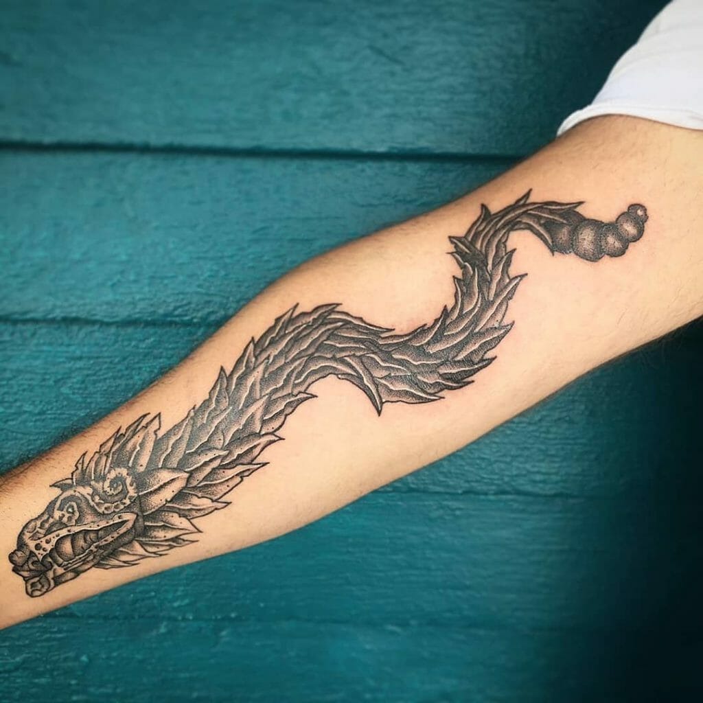 Bold Feathered Head with Minimal Detail Tattoo Design