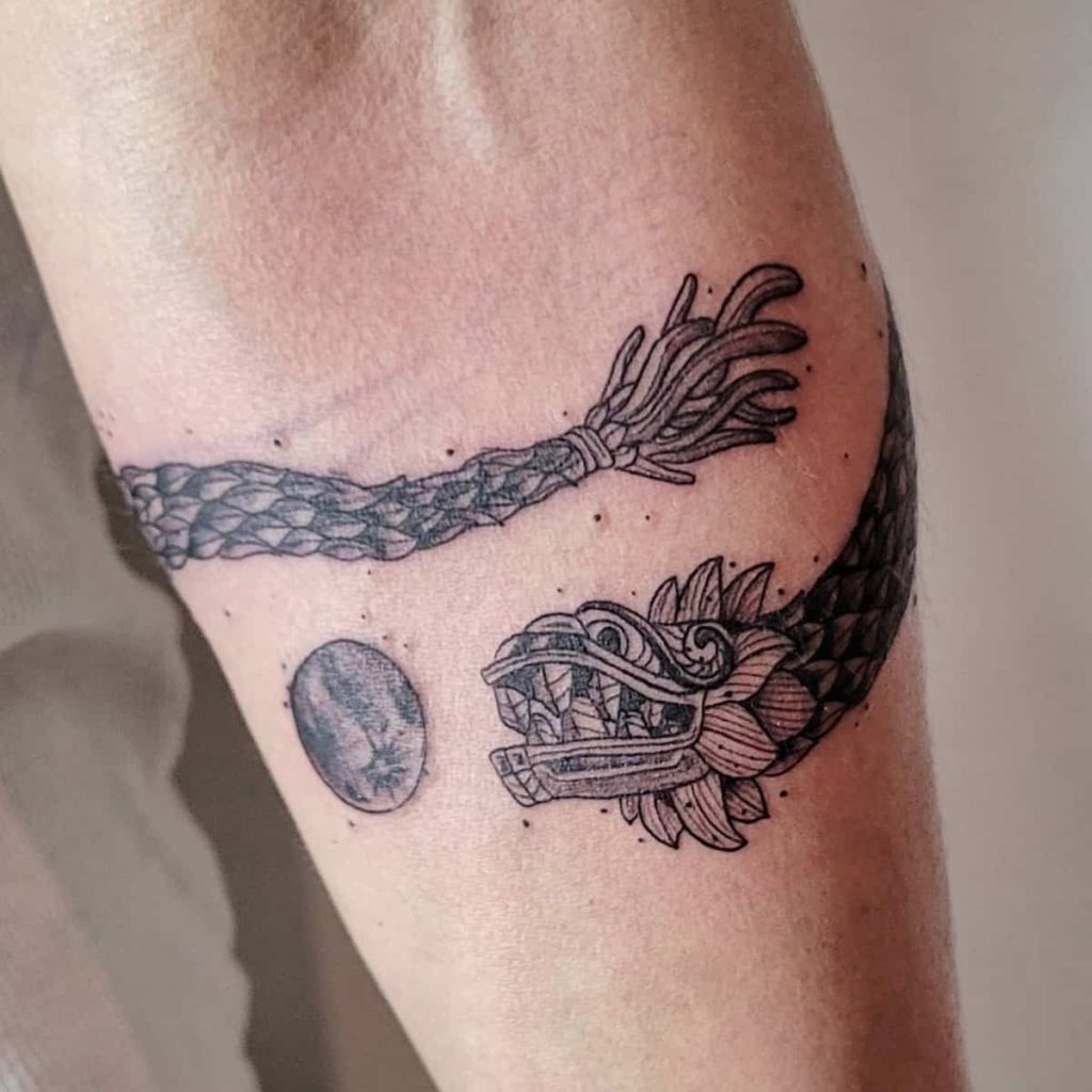 Chest Tattoo with Serpent Flow Tattoo Design