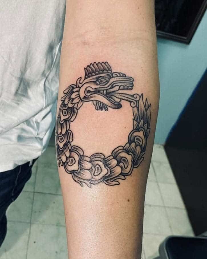 Circular Ouroboros-Inspired Quetzalcoatl Tattoo Design