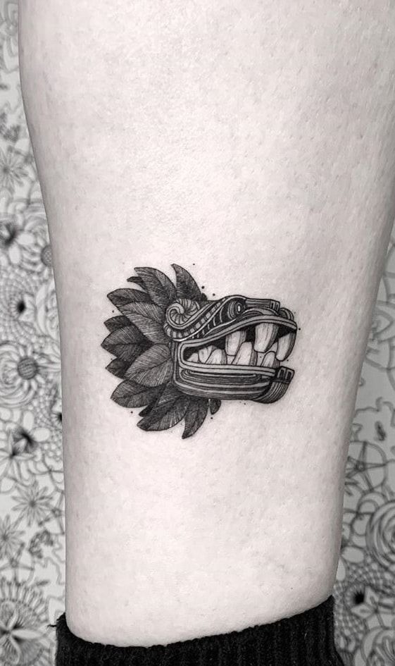 Minimalist Coiled Serpent Design Tattoo Design