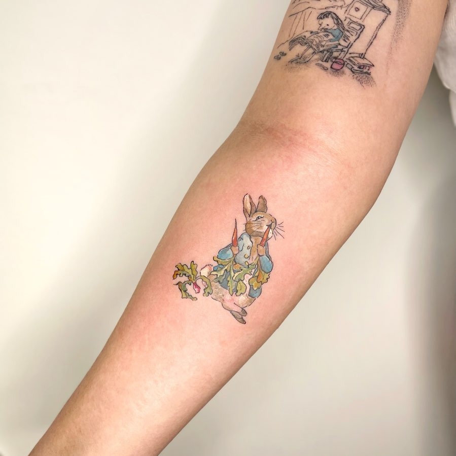 Charming and whimsical rabbit tattoo design Tattoo Design